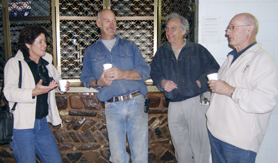 Visitors, Dr. Sue McCoy enjoying a hot cuppa at the Show with  Darryl Borrett, Sue's husband Dr. Don McCoy FGAA and Dr. Geoffrey Vercoe OAM