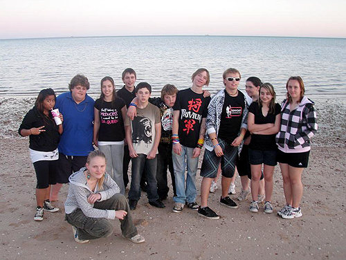 The combined Coober Pedy Area School volleyballs teams taking it easy on the Whyalla foreshore