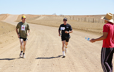 35km Runners William Banks and 'Mayor on a mission', Steve Baines get ready for refreshments on the run