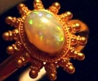 One of the opal and solid gold rings stolen by thieves